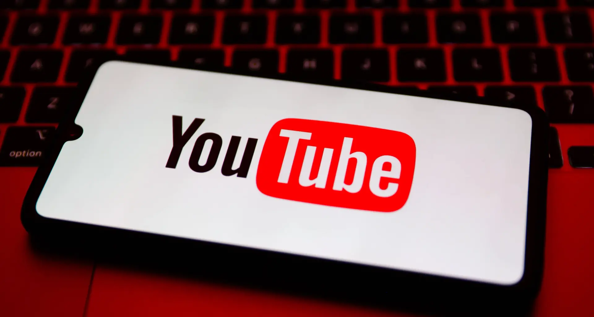 YouTube logo is displayed on a mobile phone screen for illustration photo. Krakow, Poland on February 9, 2023.  (Photo by Beata Zawrzel/NurPhoto via Getty Images)