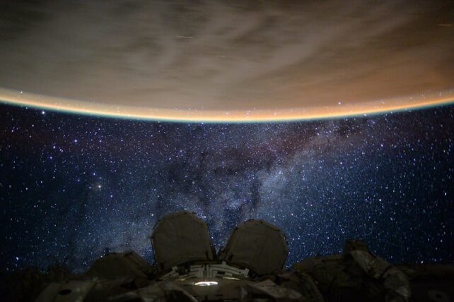 Meteor in night sky with ISS visible
