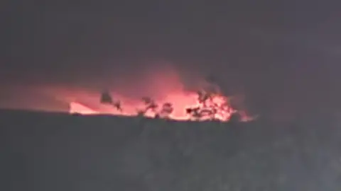 Richard Howard A night-time shot of the moorland fire at Fylingdales.