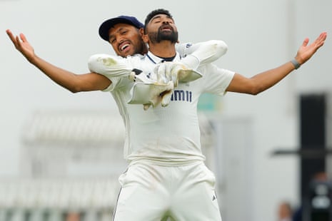 India’s Mohammed Siraj celebrates with Dhruv Jurel (rear) after taking the wicket of England’s Gus Atkinson and India winning the match to draw the test series.