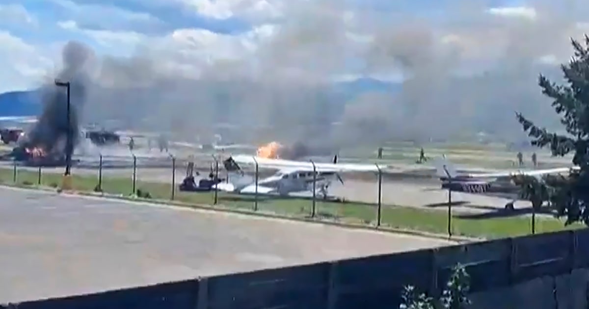 Plane crashes into parked aircraft while landing at Montana airport, sparking fire
