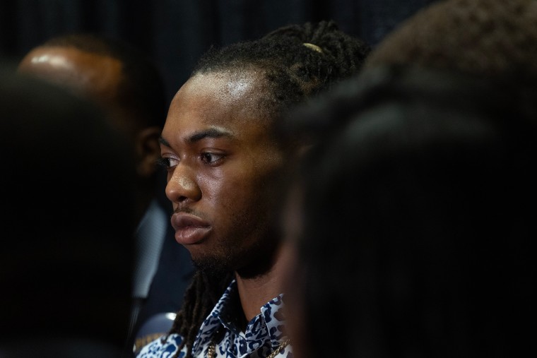 William McNeil Jr. listens as members of his legal team speak