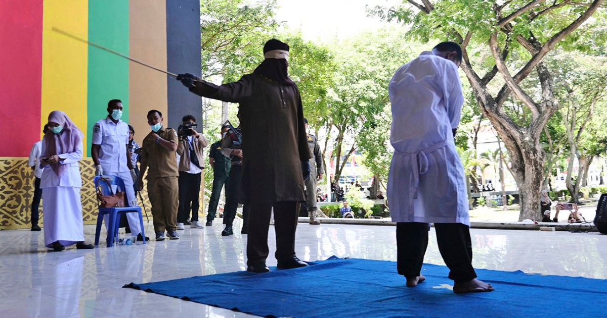 Men charged with hugging and kissing are among those publicly caned in Indonesia