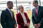 (Left to right) Oregon Health & Science University President Shereef Elnahal, Gov. Tina Kotek and Dr. Brian Druker, at the Knight Cancer Institute following the announcement.