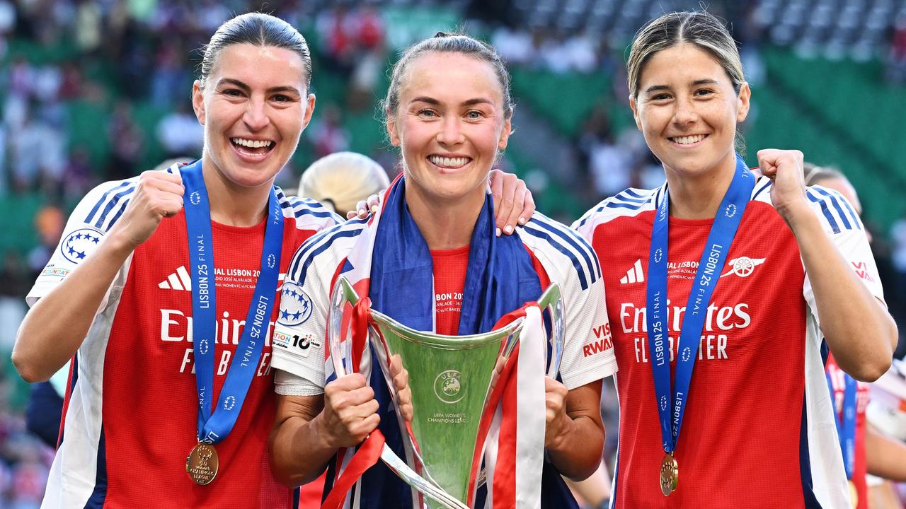 Matildas Steph Catley, Caitlin Foord and Kyra Cooney-Cross celebrate with the UEFA Women's Champions League trophy after Arsenal’s victory over Barcelona in May.