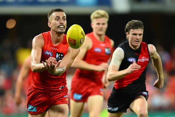 Joel Jeffrey of the Suns handballs.