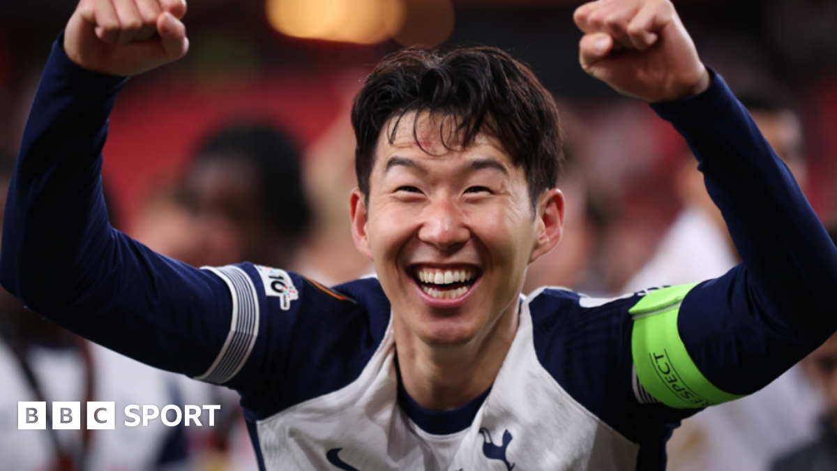 Tottenham forward Son Heung-min gives his shirt to a young fan after the League Cup quarter-final match against West Ham United in December 2021