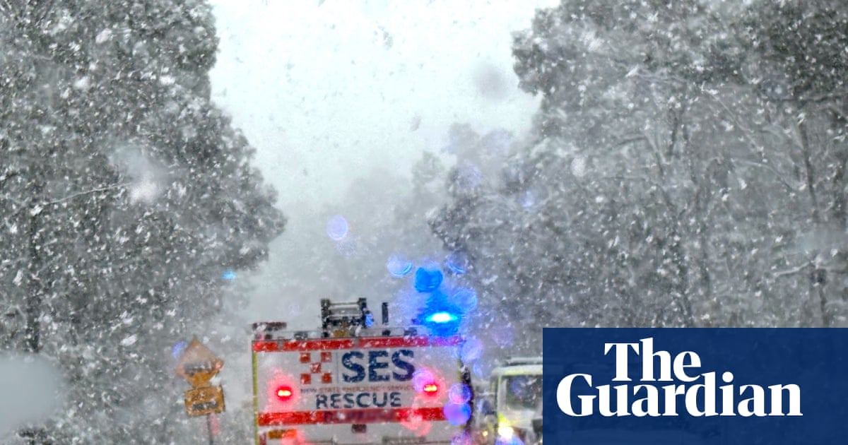 Snow falls in Queensland as NSW SES report 100 vehicles stuck in heavily blanketed northern tablelands | Australia weather