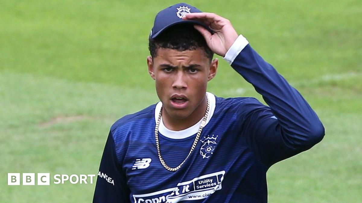Manny Lumsden puts on his cap during Hampshire's One Day Cup win over Surrey