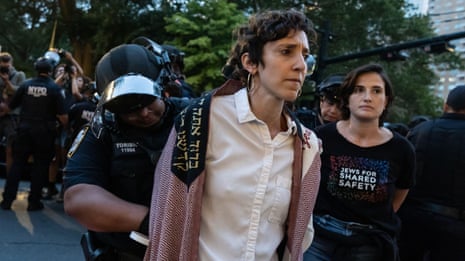 At least 40 arrested at protest against Gaza war at Trump hotel in New York – video