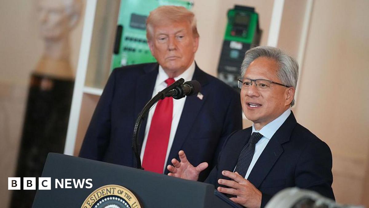 US President Donald Trump (L) listens as Nvidia CEO Jensen Huang speaks in the Cross Hall of the White House during an event on "Investing in America"