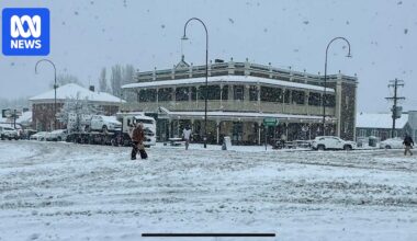 Wild weather in NSW damages buildings, isolates residents and cuts power