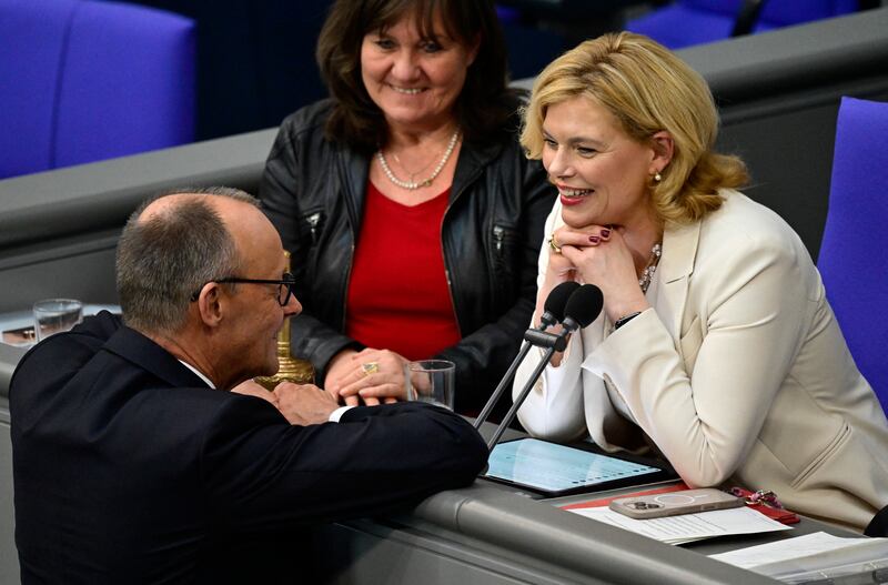 Friedrich Merz talks to Julia Klöckner in the Bundestag. Photograph: John Macdougall/Getty