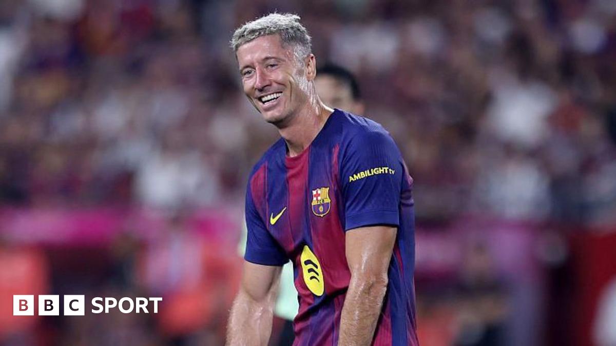 Robert Lewandowski celebrates scoring for Barcelona