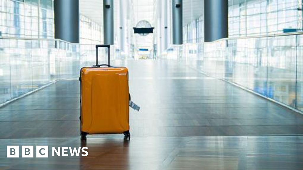 New Zealand woman arrested after two-year-old found in luggage