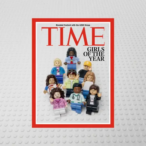 TIME A magazine mock-up, with a headline saying Girls of the Year, and nine Lego mini figures posed as the cover's image 