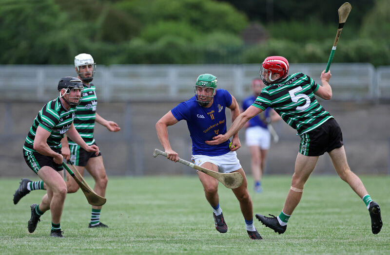  Ben Cunningham of St Finbarr's holds possession as Eoin O'Flynn of Douglas closes in. Picture: Jim Coughlan