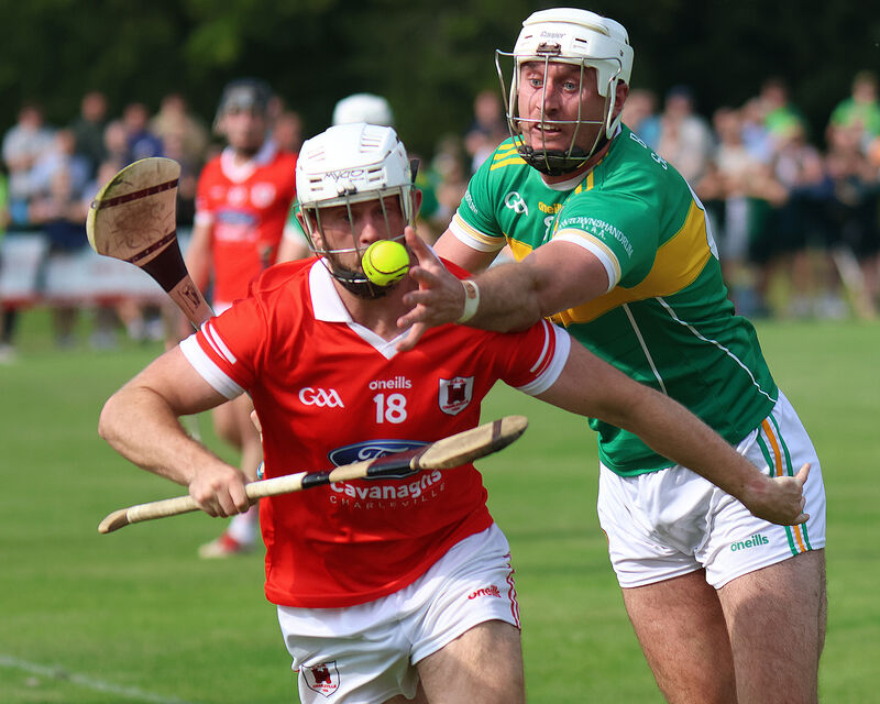 Darren Casey of Charleville tries to hold off Newtownshandrum's Tim O'Mahony. Picture@ Brendan Gleeson