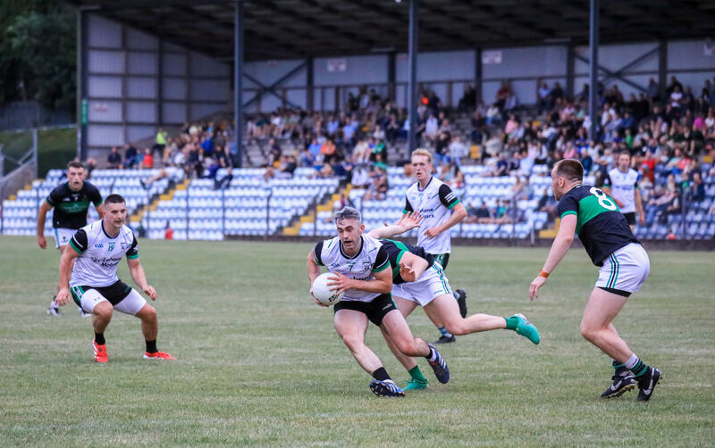Douglas' Conor Kingston in action against Nemo's Mark Hill. Picture: David Creedon