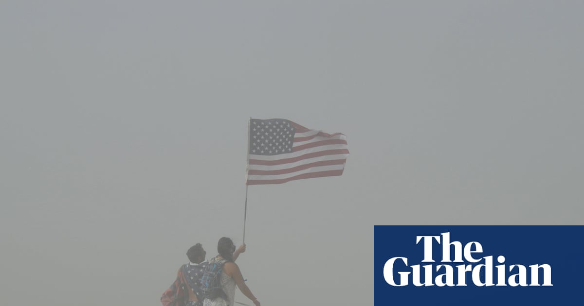 ‘Wall of blowing dust’ sweeps through Burning Man festival upending camps | Burning Man festival