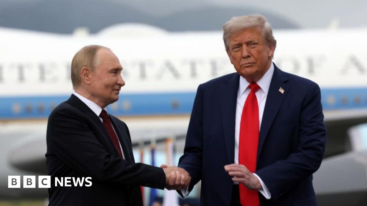 US President Donald Trump and Ukraine's President Volodymyr Zelensky sitting side by side during a meeting in the Oval Office of the White House on February 28