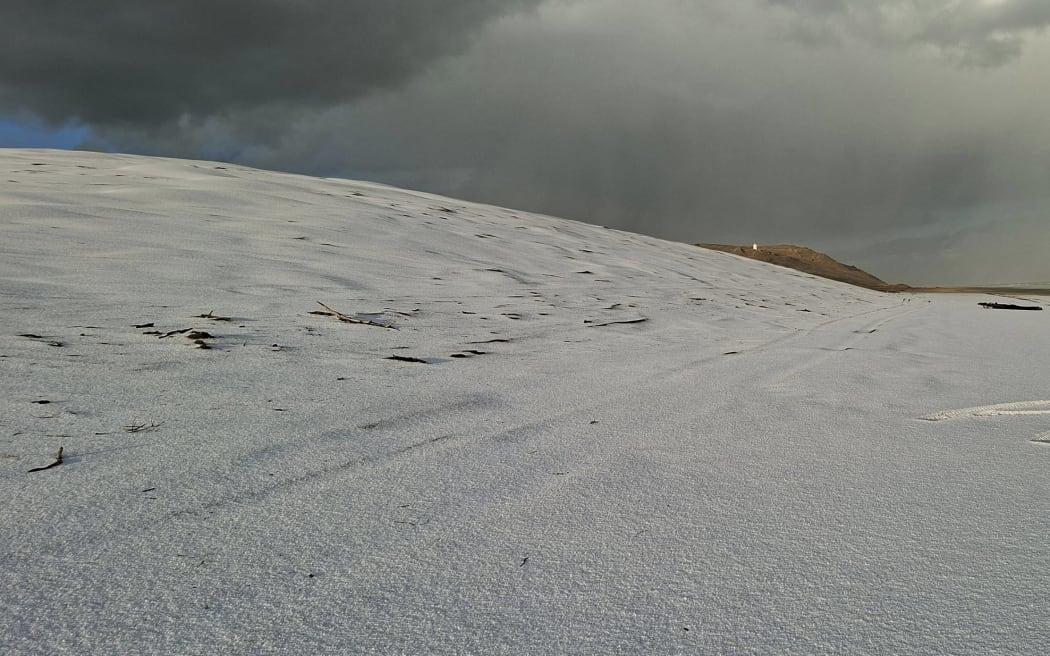 Freak storm covers Northland beach in hail