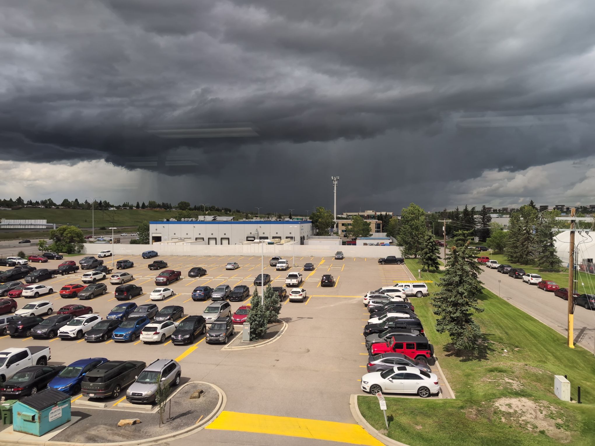 An Airdrie resident captured dark storm clouds and heavy rain moving over Calgary during Thursday’s severe weather.