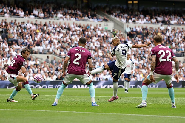 Richarlison of Tottenham Hotspur scores his team's first goal.