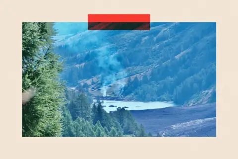 Angus MacKenzie Blatten is seen in the distance