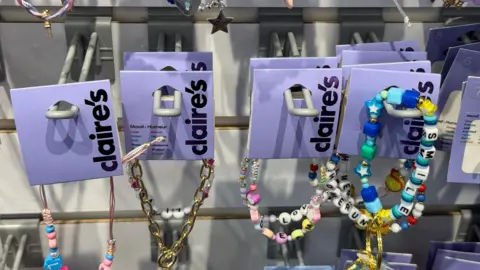 Getty Images Claire's colourful bracelets on a typical rack in a store