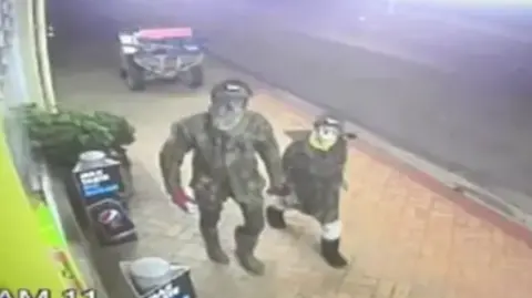 NZ Police CCTV footage captured Phillips with one of his children attempting to break into a store in Piopio