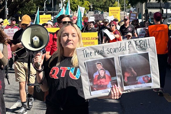 Queensland teachers march through Brisbane on their way to Parliament House.