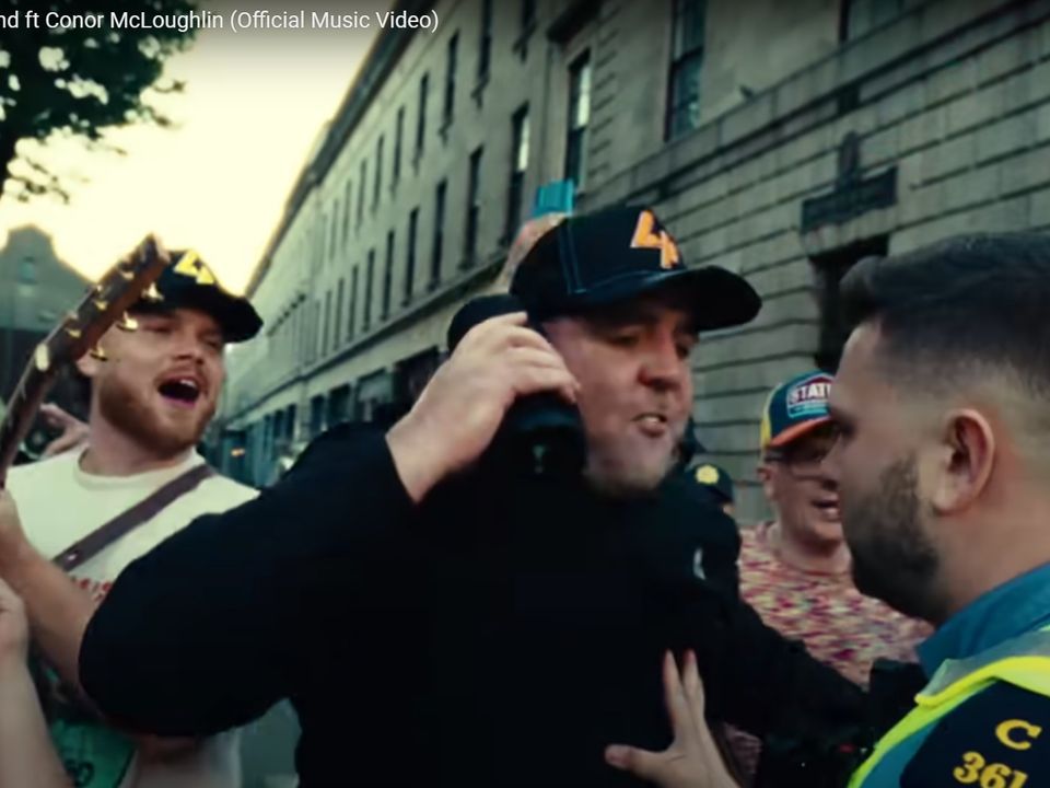 Convicted crminal turned rapper Jordan McCann (black hat) in Dublin