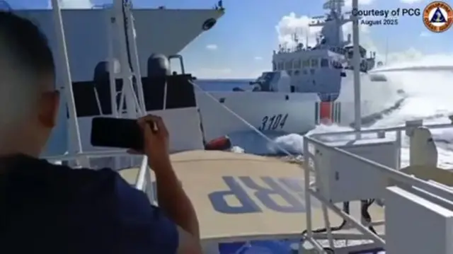 The video starts with a Philippines Coast Guard ship being chased by a Chinese vessel