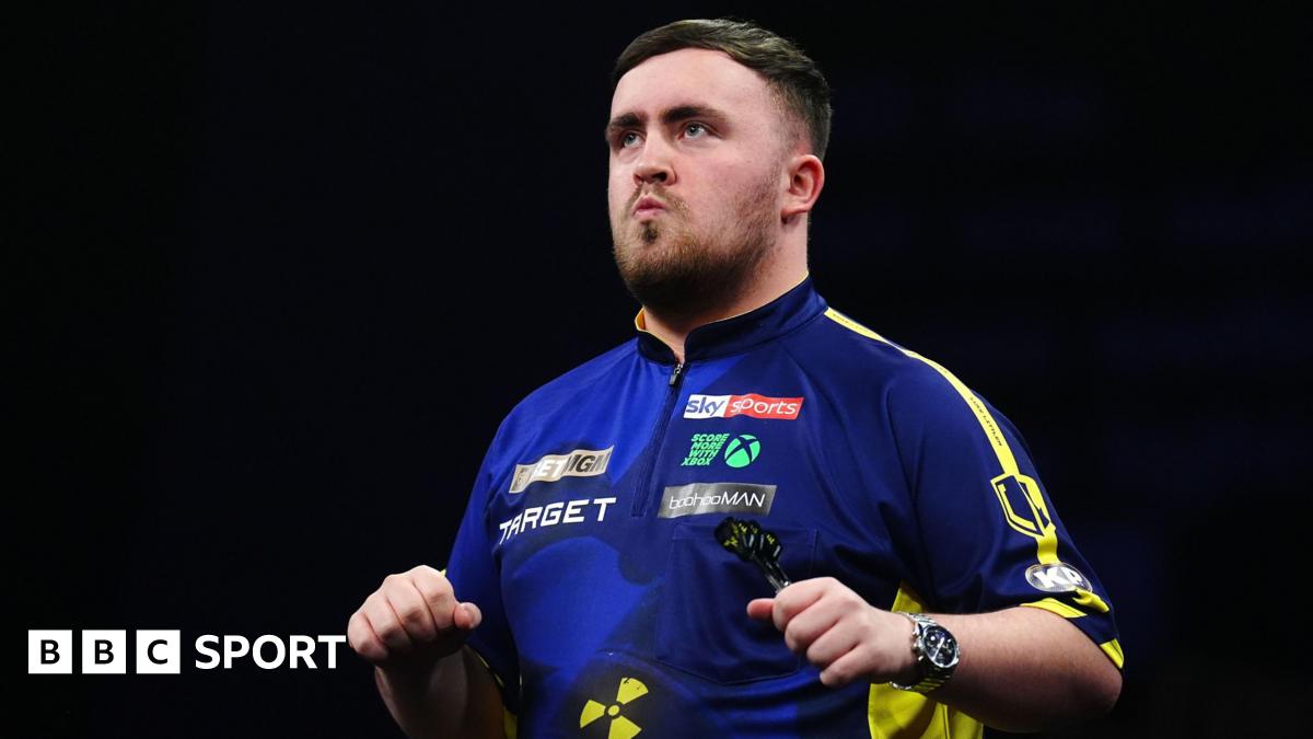 Luke Littler celebrates