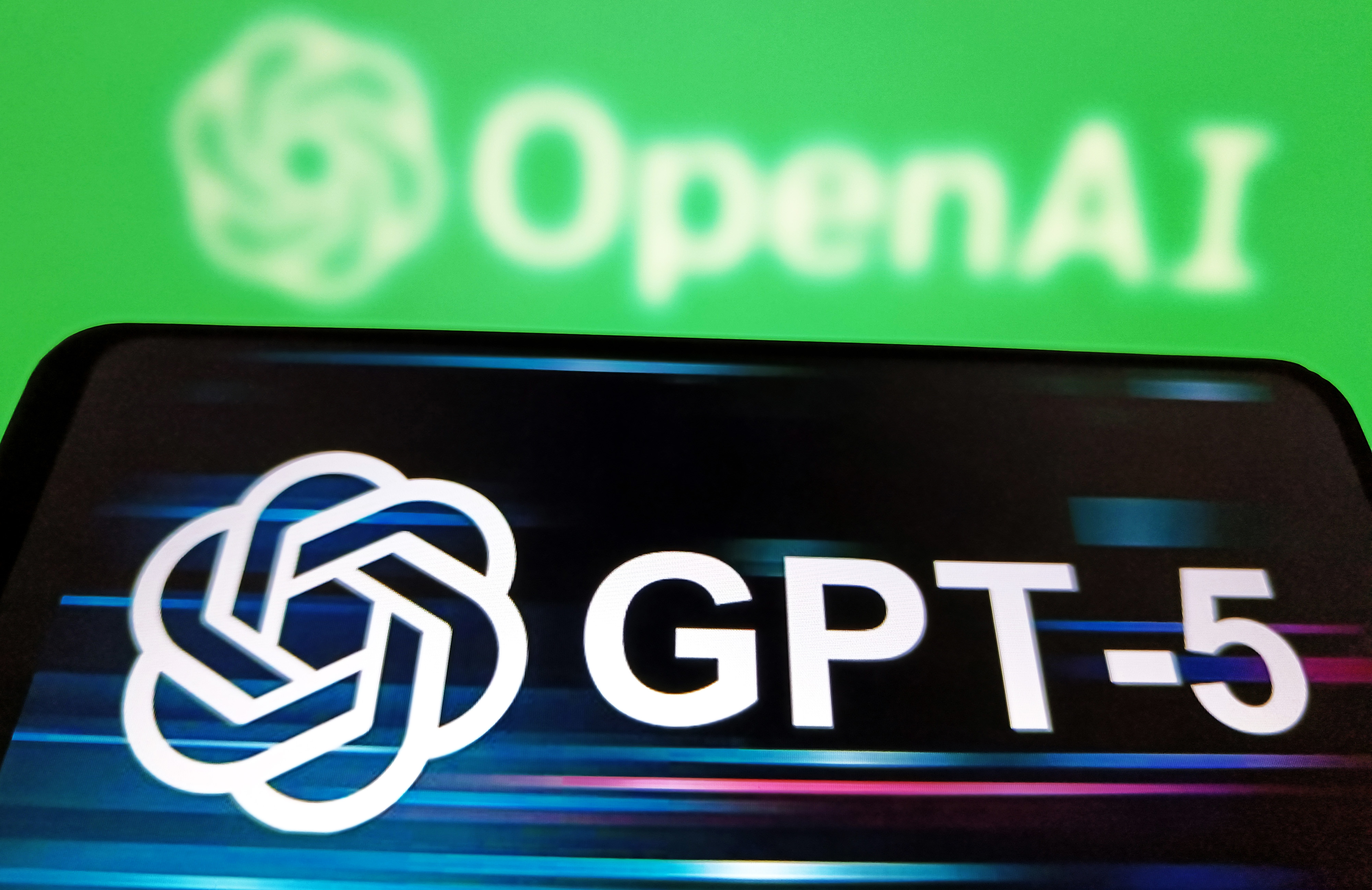 SUQIAN, CHINA - AUGUST 7, 2025 - A illustration photo shows the GPT-5 displayed in a smartphone with the OpenAI logo in background in Suqian, Jiangsu Province, China on August 7, 2025. (Photo credit should read CFOTO/Future Publishing via Getty Images)