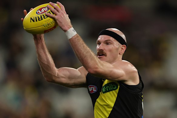 Kamdyn McIntosh of the Tigers controls the ball.