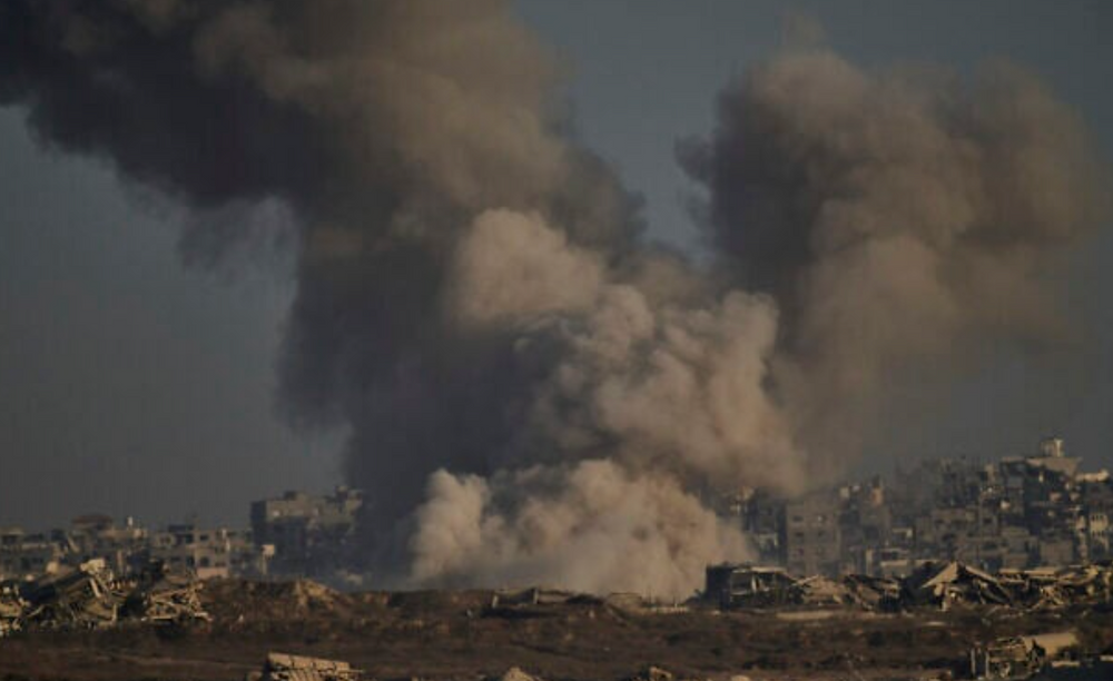 A pillar of smoke rises following an IDF strike in Gaza on August 30, 2025