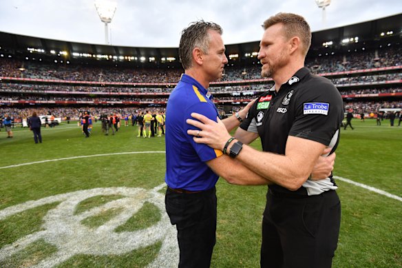 Over to you: Adam Simpson (left) has withdrawn from the Melbourne coaching race, strengthening Nathan Buckley’s hopes of winning the key role.