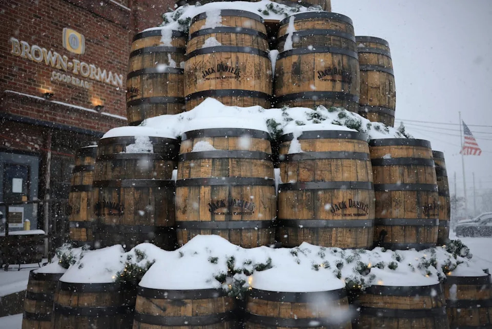 A stack of Jack Daniel's whiskey barrels sits outside the Brown-Forman Corp. cooperage on Jan. 5, 2025 in Louisville, Ky. Brown-Forman is the parent company to alcohol producers such as Jack Daniel's and Woodford Reserve.