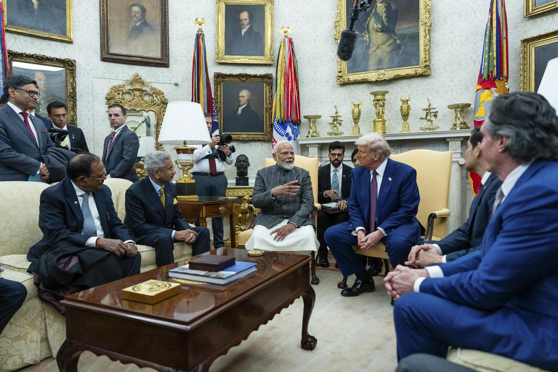 FILE — President Donald Trump with Prime Minister Narendra Modi of India during a meeting in the Oval Office of the White House in Washington, Feb. 13, 2025. With threats of tariffs up to 50 percent, President Trump seems to be scrapping America’s plan to turn India into a counterweight to China, declaring instead that it was a “dead economy.” (Eric Lee/The New York Times)