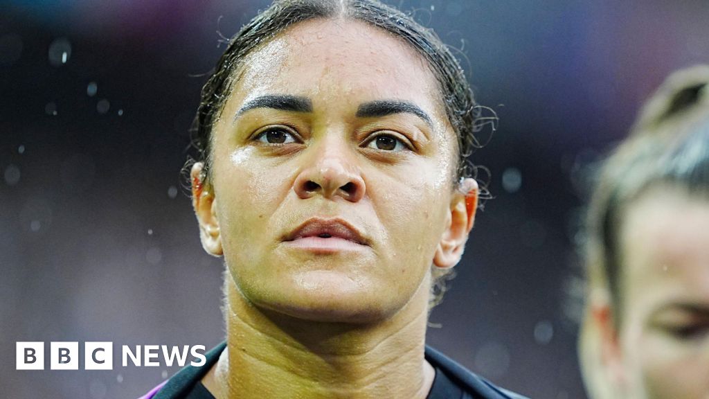 Man held over racist abuse sent to England footballer