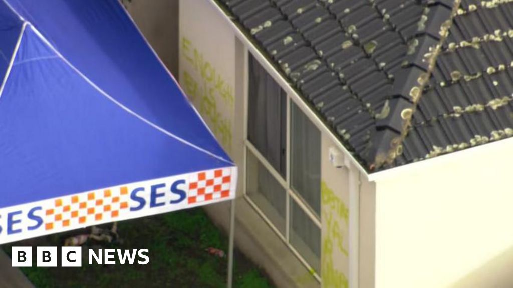 Man charged with murder of Australian couple in graffiti-covered house