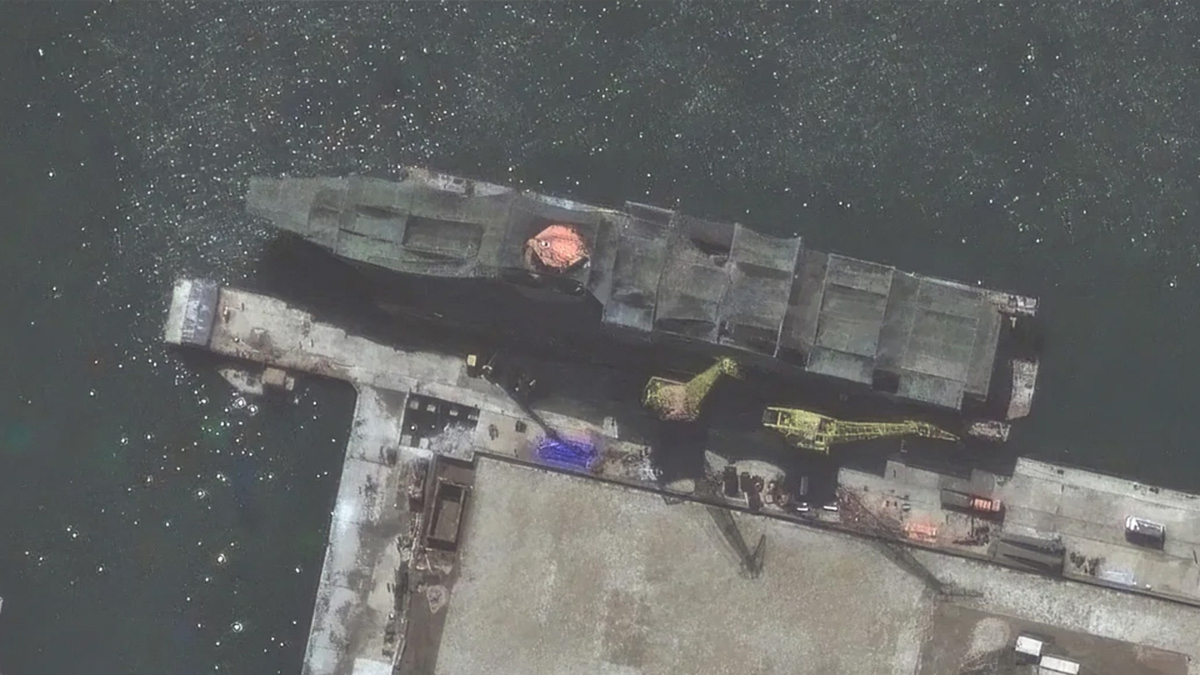 Satellite images reveal North Korea is constructing the largest and most advanced warship ever.