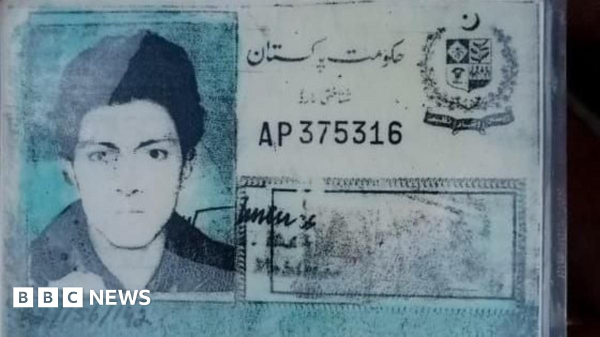 Identification card with blurred protrait photo and faded print