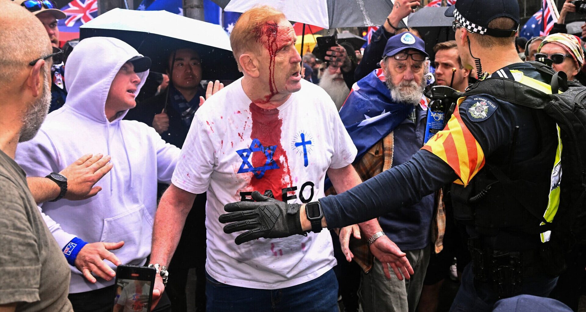 Australia condemns neo-Nazi-linked rally of 'hate' as thousands march against immigration