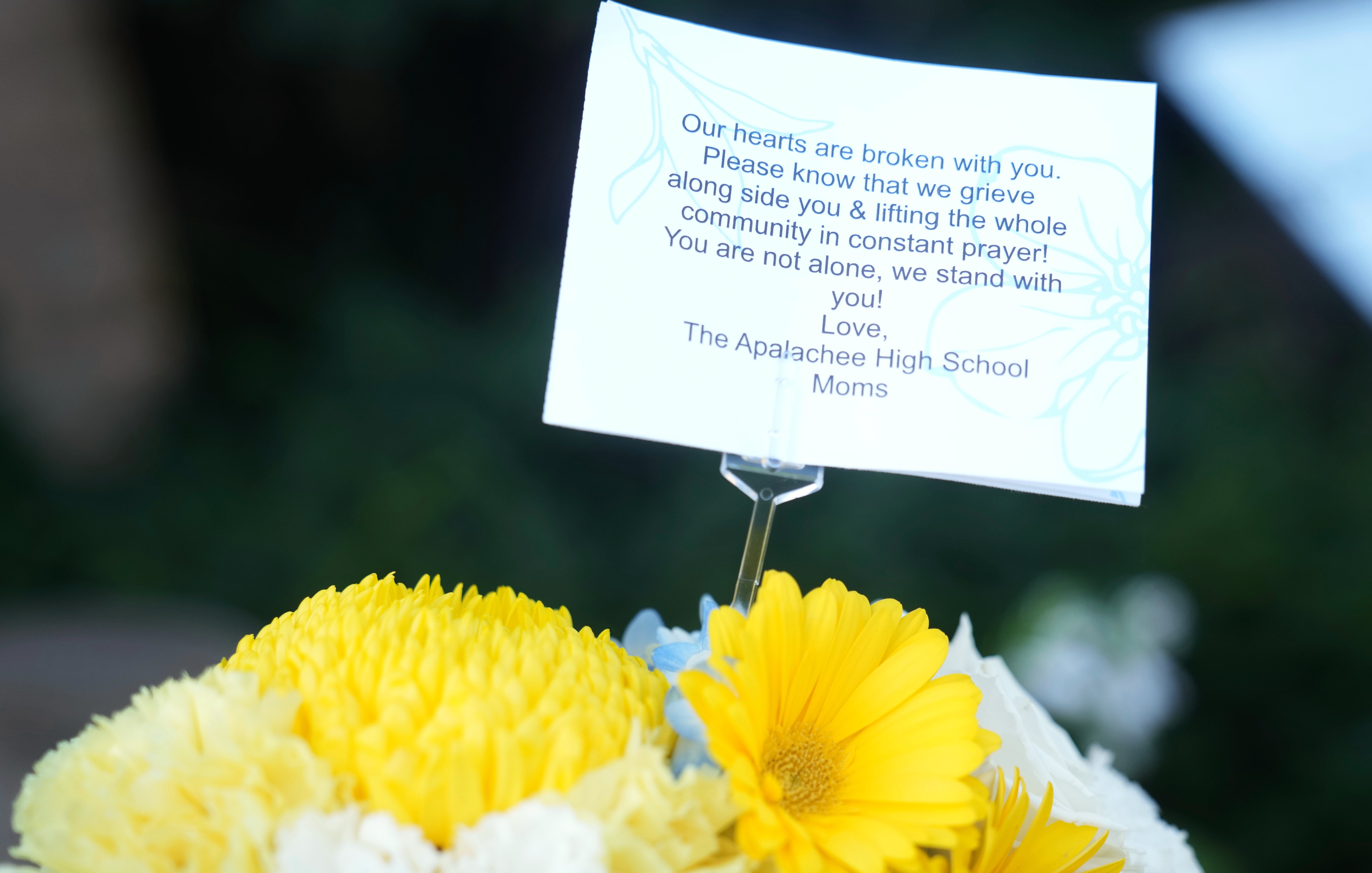 Flowers were also left on behalf of the Apalachee High School moms