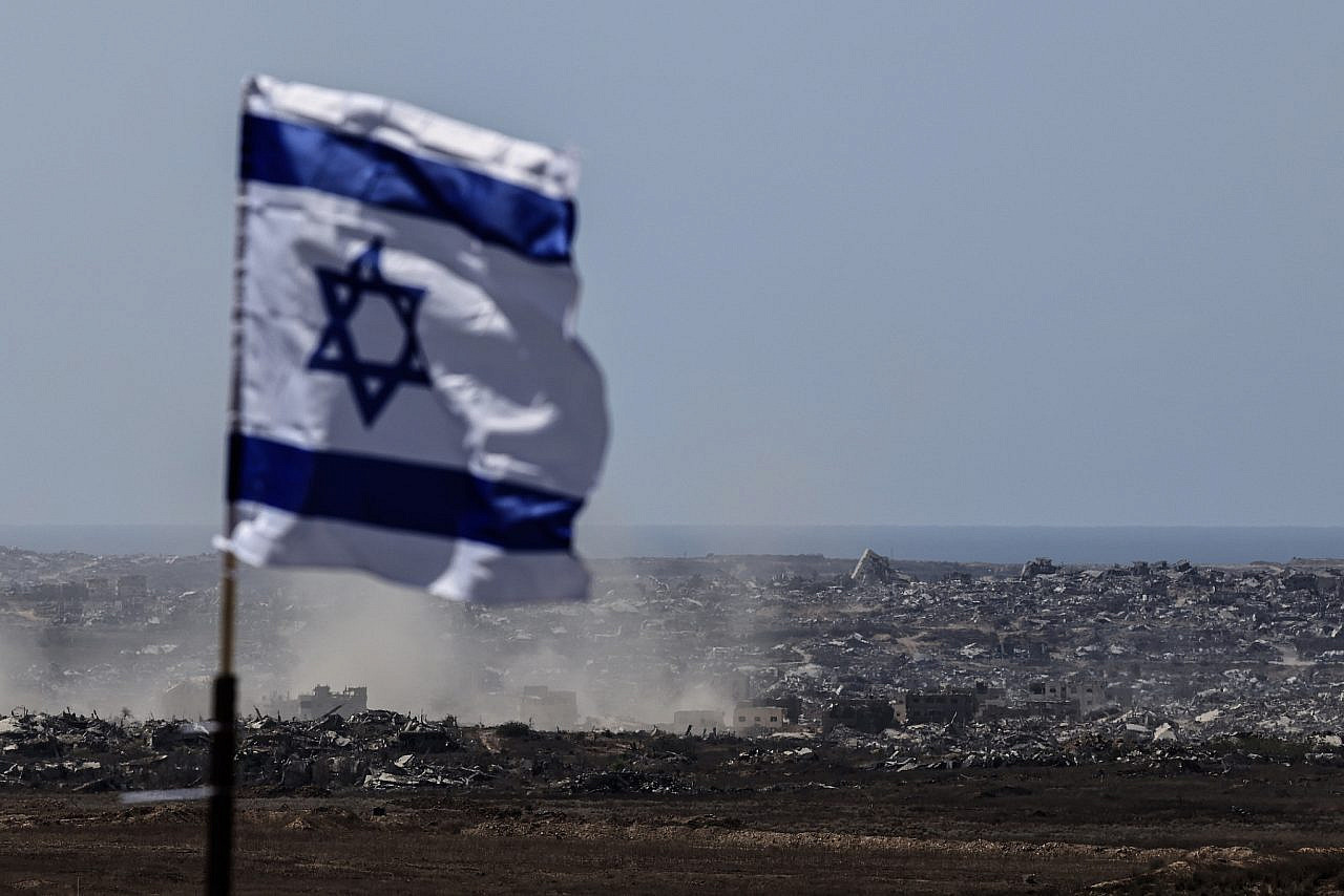 Smoke rises from an Israeli military strike in the northern Gaza Strip, as seen from the Israeli side of the border, July 30, 2025. (Tsafrir Abayov/Flash90)
