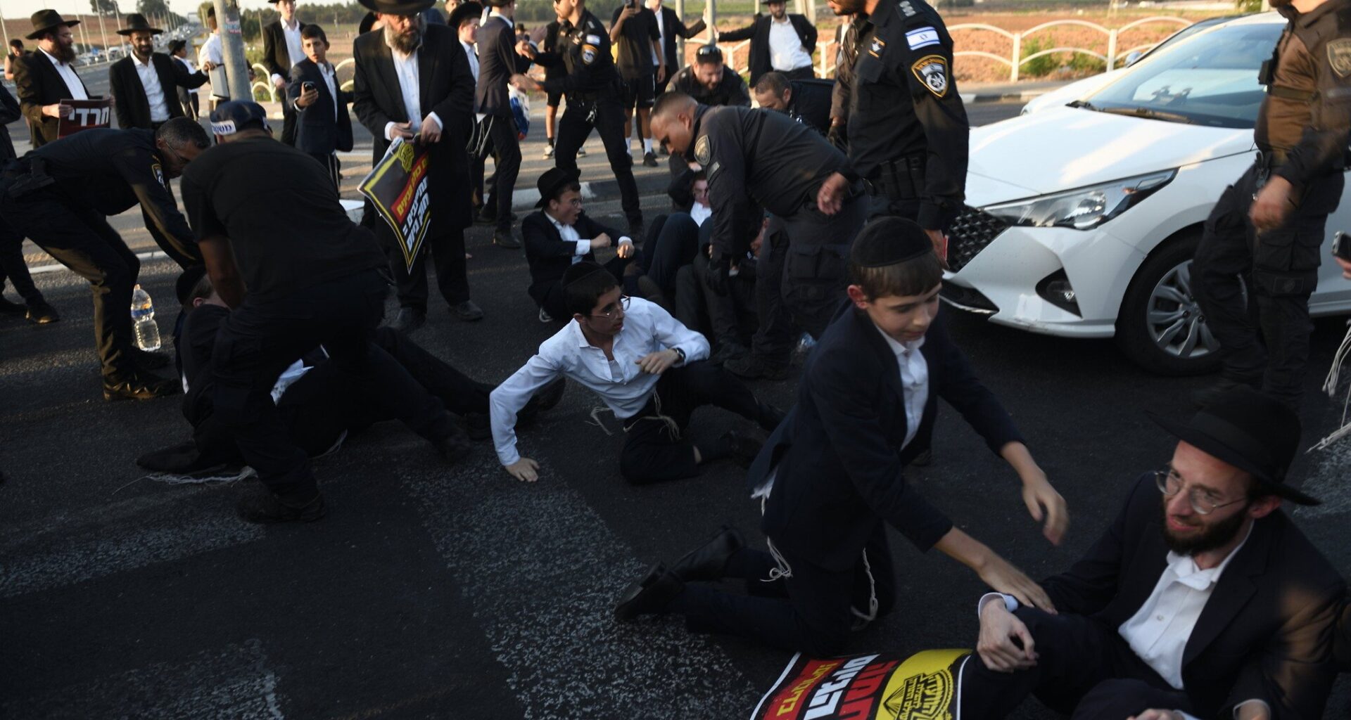 Haredi anti-enlistment protesters block roads, clash with motorists in ‘day of rage’ - The Times of Israel