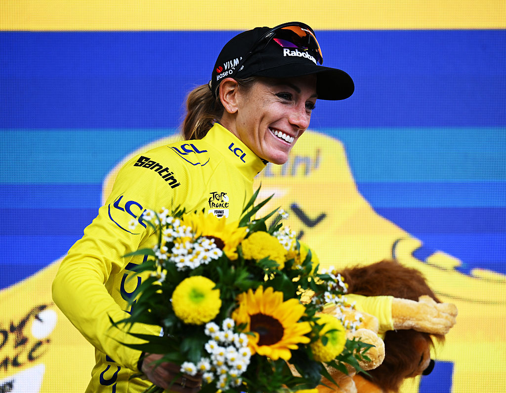 Pauline Ferrand-Pr&eacute;vot on the podium wearing the yellow jersey at the Tour de France Femmes 2025